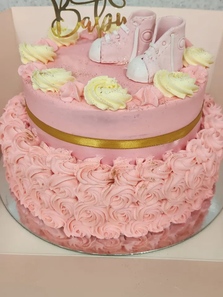 Two-tier pink rosette cake