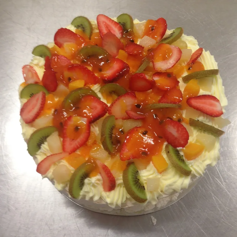 Pavlova, crisp meringue with soft centre, cream and fruit